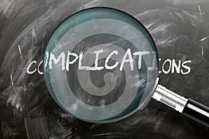 Learn, study and inspect complications - pictured as a magnifying glass enlarging word complications, symbolizes researching,