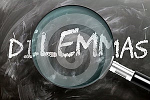 Learn, study and inspect dilemmas - pictured as a magnifying glass enlarging word dilemmas, symbolizes researching, exploring and photo