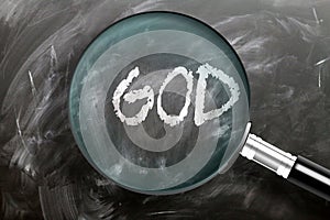 Learn, study and inspect god - pictured as a magnifying glass enlarging word god, symbolizes researching, exploring and analyzing