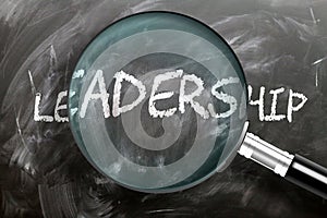 Learn, study and inspect leadership - pictured as a magnifying glass enlarging word leadership, symbolizes researching, exploring