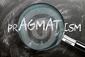 Learn, study and inspect pragmatism - pictured as a magnifying glass enlarging word pragmatism, symbolizes researching, exploring photo