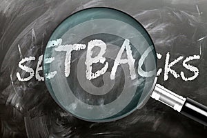 Learn, study and inspect setbacks - pictured as a magnifying glass enlarging word setbacks, symbolizes researching, exploring and