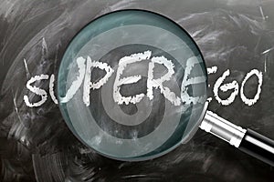 Learn, study and inspect superego - pictured as a magnifying glass enlarging word superego, symbolizes researching, exploring and