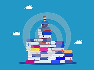 Learn to be successful in life. person researching on stack of books