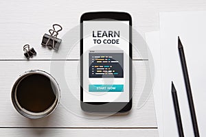 Learn to code concept on smart phone screen