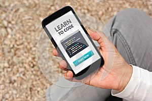 Learn to code concept on smartphone screen