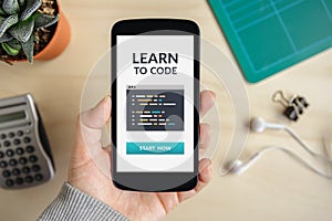 Learn to code concept on smartphone screen