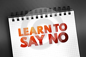 Learn To Say No text quote on notepad, concept background