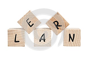 Learn Written With Wooden Blocks.