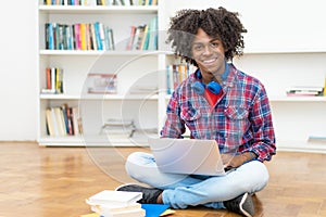 Learning african american young adult with computer photo