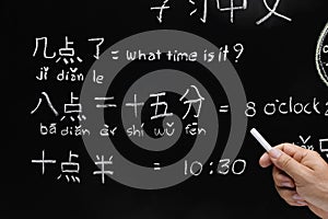 Learning chinese to tell time.