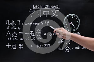 Learning chinese to tell time.