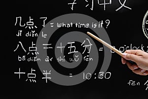 Learning chinese to tell time.