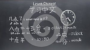 Learning Chinese to tell time in class room