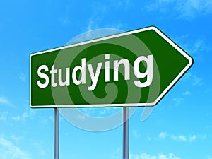 Learning concept: Studying on road sign background