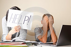 Learning difficulties, remote education, online learning and working at home. Tired mother and sad kid need help to do