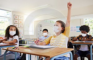 Learning, education and classroom in covid pandemic with students wearing face mask for protection against the spread of