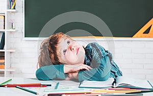 Learning and education concept. Children learning. Child tutoring. Home study. Portrait of Pupil in classroom.