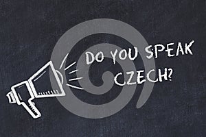 Learning foreign languages concept. Chalk symbol of loudspeaker with phrase do you speak czech