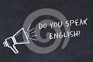 Learning foreign languages concept. Chalk symbol of loudspeaker with phrase do you speak english