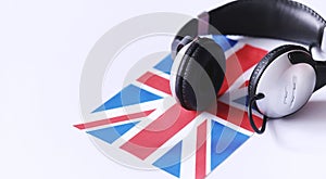 Learning foreign languages. Notepad for entries and a flag. Lang