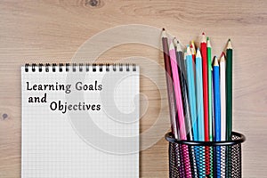 Learning Goals and Objectives words on notebook photo