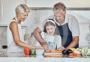 Learning, grandparents or girl cooking as a happy family in a house kitchen with organic vegetables for dinner