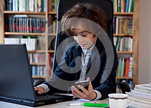 Learning at home, online learning, self quarantine concept. Children doing homework with books, textbooks and with computer online