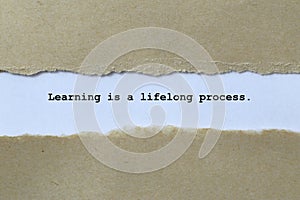 learning is a lifelong process on white paper