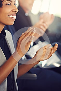 Learning more about business by attending a seminar. Cropped shot of a group of diverse businesspeople clapping during a