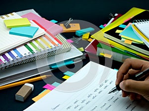 Learning New Language Writing Words Many Times on the Notebook;