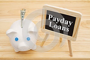 Learning about payday loans with a piggy bank