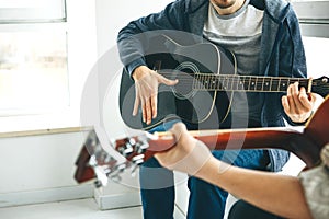 Learning to play the guitar