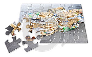 Learning to recycle - concept image in jigsaw puzzle shape - Stacks of paper and cardboard ready to be recycled