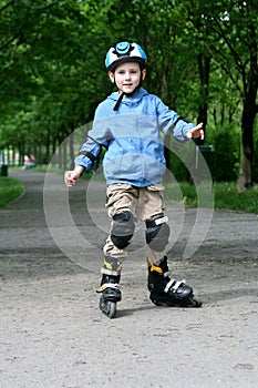 Learning to ride on rollerblades photo