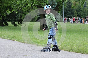 Learning to ride on rollerblades photo