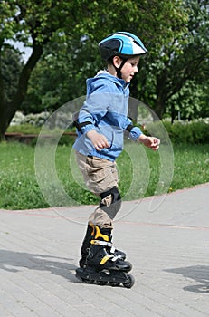 Learning to ride on rollerblades photo