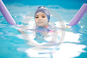 Learning to swim child portrait