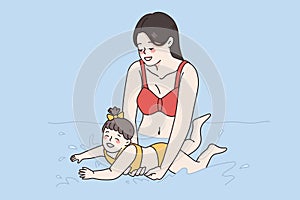 Learning to swim and happy parenthood concept.