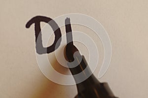 Handwriting - writing text on a white sheet of paper