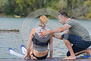she learning waterski with instructor
