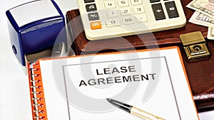 Lease agreement. The inscription in the document form on the business planning folder.