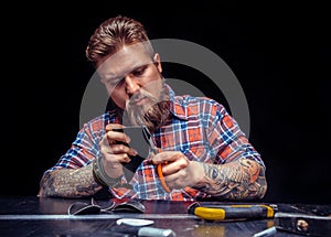 Professional Leather Worker at work at his workshop