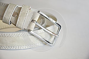 Leather belt. white belt on a light background.