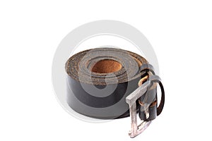 Leather belts over white background