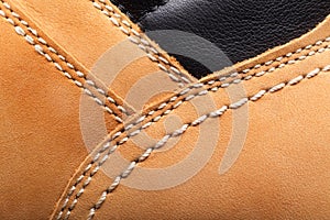 Leather boots stitched thread