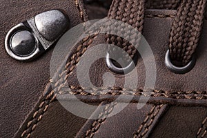 Leather boots stitched with thread backgrounds