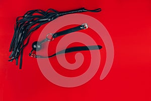 Leather braid on a red background,