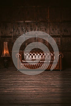 Leather Chester sofa in wooden room interior with an old floor lamp. Brown tinted image