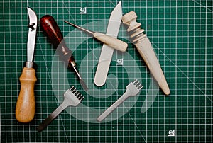 Leather crafting tools still life. handmade. leather tools